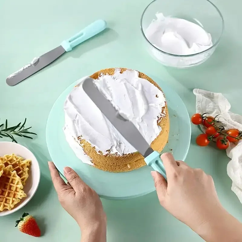 All-in-One 100-Piece Cake Decorating Set – Includes Turntable, Tips, Spatulas & Bags, pink or green.